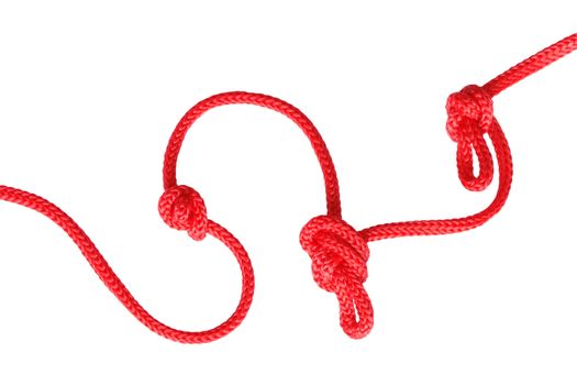 Closeup of red rope with knots isolated on white background with clipping path