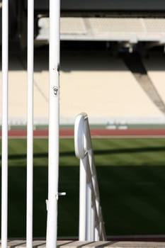 stadium gate detail with  blur tiers and field in background