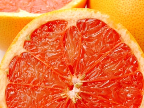 Close-up of a half cut ruby grapefruit