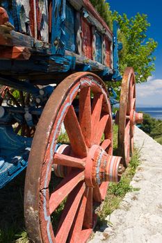 Colorful wagon with red wheels