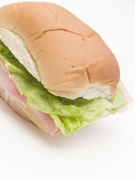 sandwich of ham, cheese and lettuce
