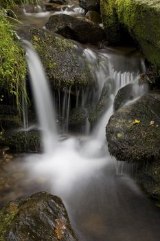 Long exposure shot of a waterfall on a creek.