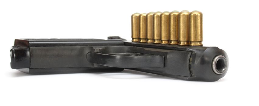 pistol isolated on white background with 	
ammunition