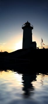 Nobska Lighthouse reflected in water
