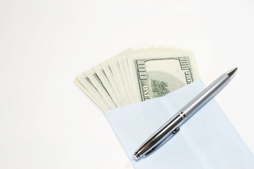 Sending Money in an envelope with pen in a white background