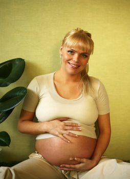 Pregnant woman on the ninth month. The boy was born next day