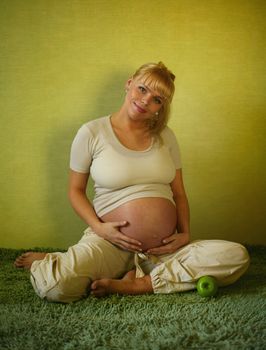 The pregnant woman on the ninth month. The child will be born one of these days