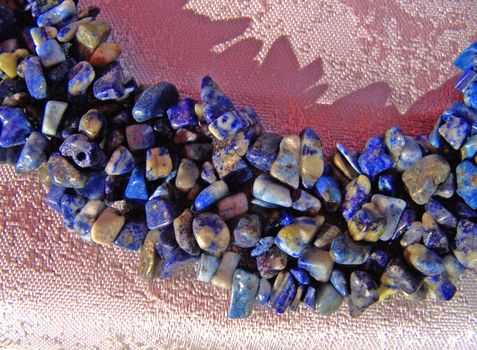 Lazurite preetty stone gems. Close up. Colorful.