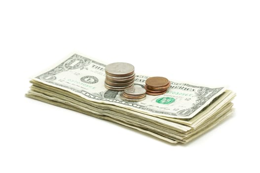 Stack of Money & Coins Isolated on a White Background.