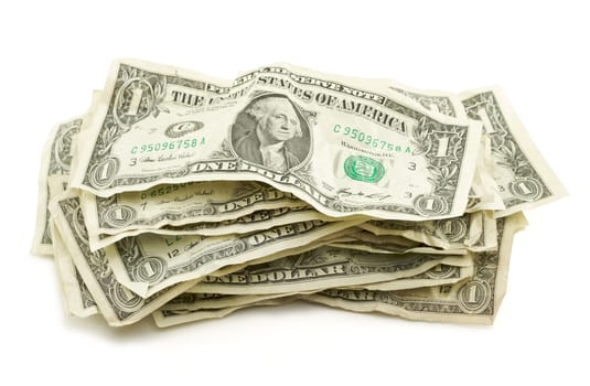 Pile of Crumpled Dollar Bills Isolated on a White Background.