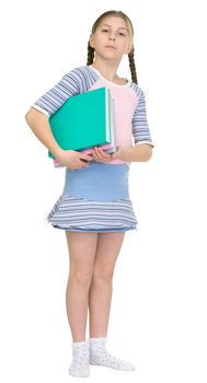 The schoolgirl has a large armful of books