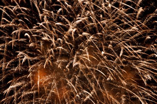 Abstract fireworks background. Cascade of sparks.