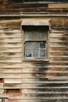 image of an old grungy wooden wall and window