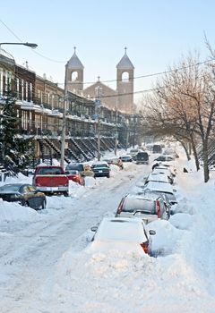 Urban street after the snowstorm. Winter in Montreal.