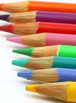 Pencil crayons, organized in an angled view, white background