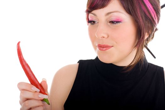 Sexy hot woman looking at red chilli peppers