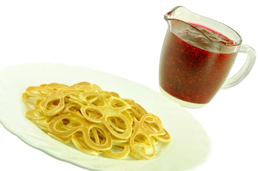 Pancake Flowers on White Plate with Cranberry Jam Isolated on White