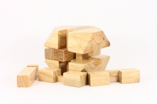 Wooden puzzle isolated on an white background