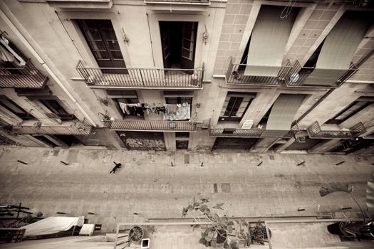 Looking down into the narrow streets from a rooftop in Barcelona. Taken in the El Borne district