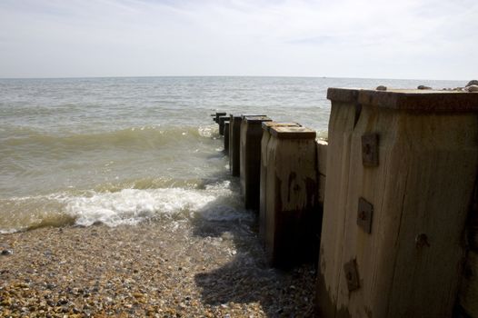 Groyne leading into the sea on a cold day