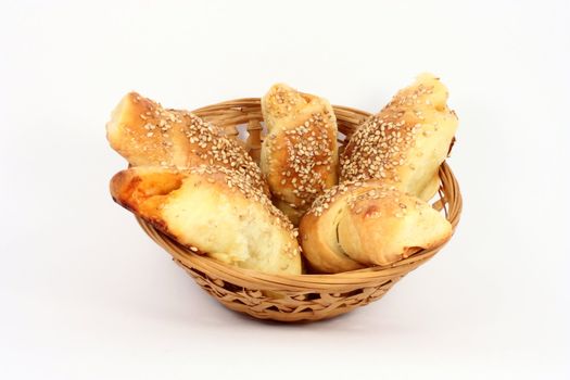 Pastry in a little basket, isolated on white