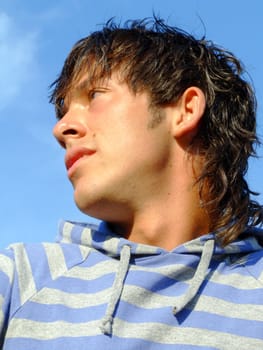 Portrait of a young man with a striped t-shirt