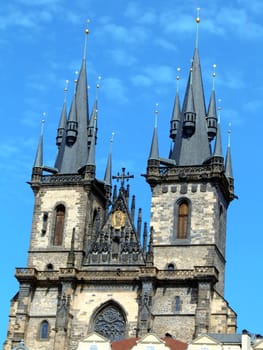 In the 11th century this area was occupied by a romanesque church, which was replaced by an early gothic Church of Our Lady before Tyn in 1256. Construction of present church started in the 14th century in late gothic style, under the influence of Matthias of Arras, and later Peter Parler. At the beginning of the 15th century, construction was almost done