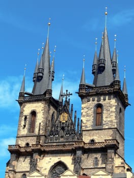 In the 11th century this area was occupied by a romanesque church, which was replaced by an early gothic Church of Our Lady before Tyn in 1256. Construction of present church started in the 14th century in late gothic style, under the influence of Matthias of Arras, and later Peter Parler. At the beginning of the 15th century, construction was almost done