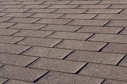 Construction: Detail of shingles on house rooftop.