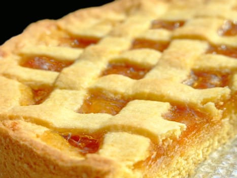 Closeup of a homemade apricot marmalade tart