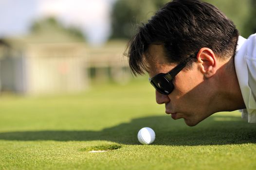 Man playing golf