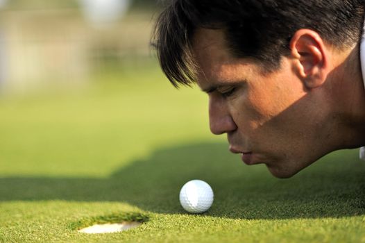 Man playing golf