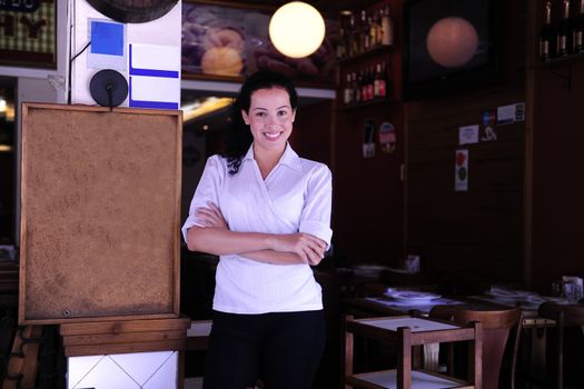 small business: happy owner of a restaurant