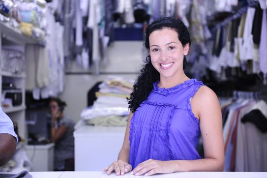 small business: happy owner of a dry cleaning service