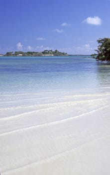 A deserted island beach on the Romantic Great Exuma Island, The Bahamas.