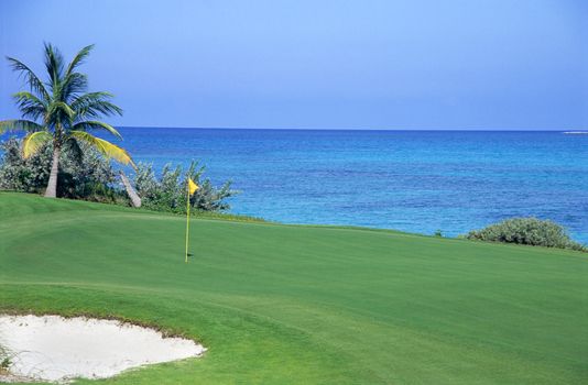 The final hole at a tropical golf course