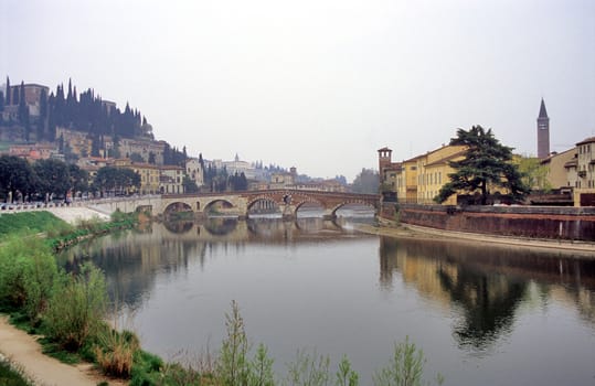 A quiet, misty morning in Verona, Italy.