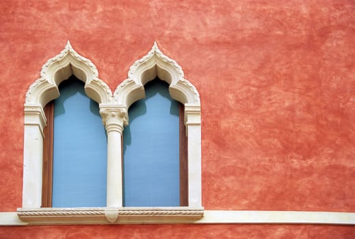 Oranate windows decorate a Verona home.