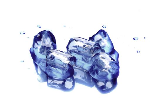 blue ice cubes with reflexion and small water drops around, isolated on white
