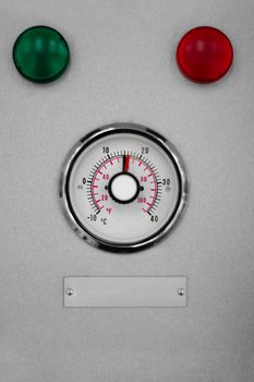 industrial temperature meter with green and red indicators above