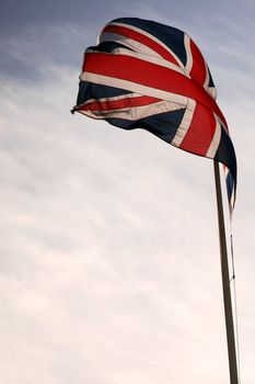 british union flag against cloudy sky