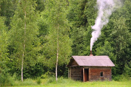 bathhouse in farmstead near forest, northern Belarus