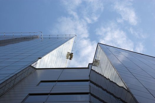 Modern blue skyscraper with the air backround