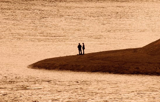 Meeting at the waterfront in the evening.