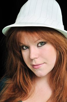 beautiful redheaded girl wearing white hat