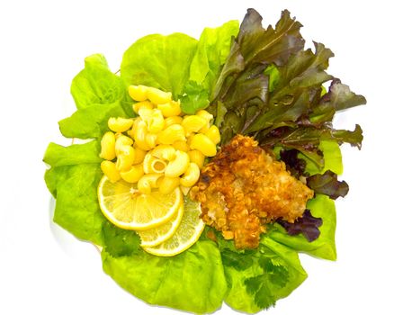  The image of macaroni, of a fish and slices of a lemon close up