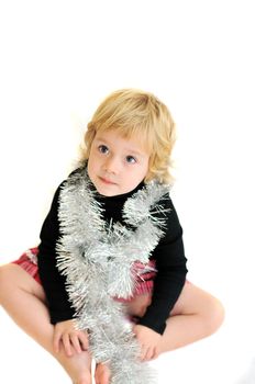 funny girl wearing christmas decoration siting on the white background