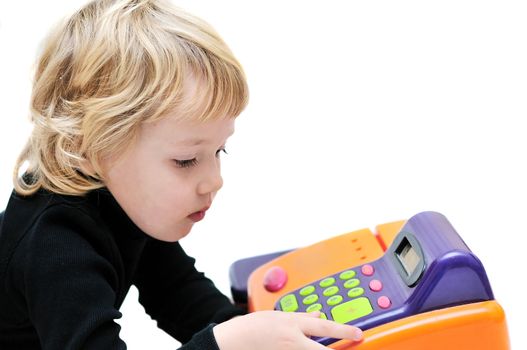 toddler girl playing with cash register over white.