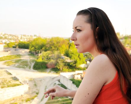 smoking beutiful brunette is smoking by ourselves