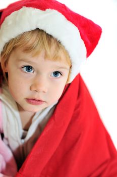 funny little Santa girl over white background